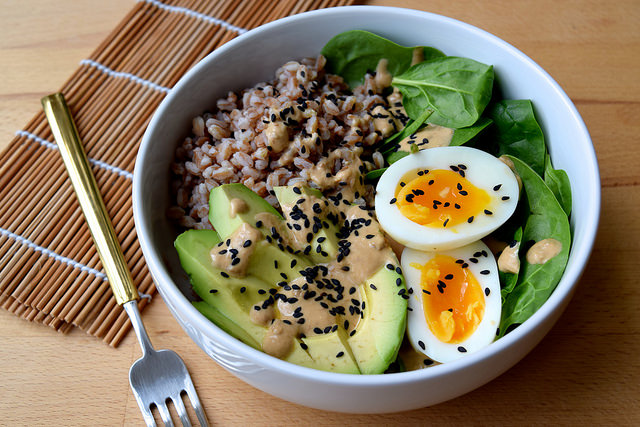 recipe: farro, avocado & egg breakfast bowl with miso yogurt